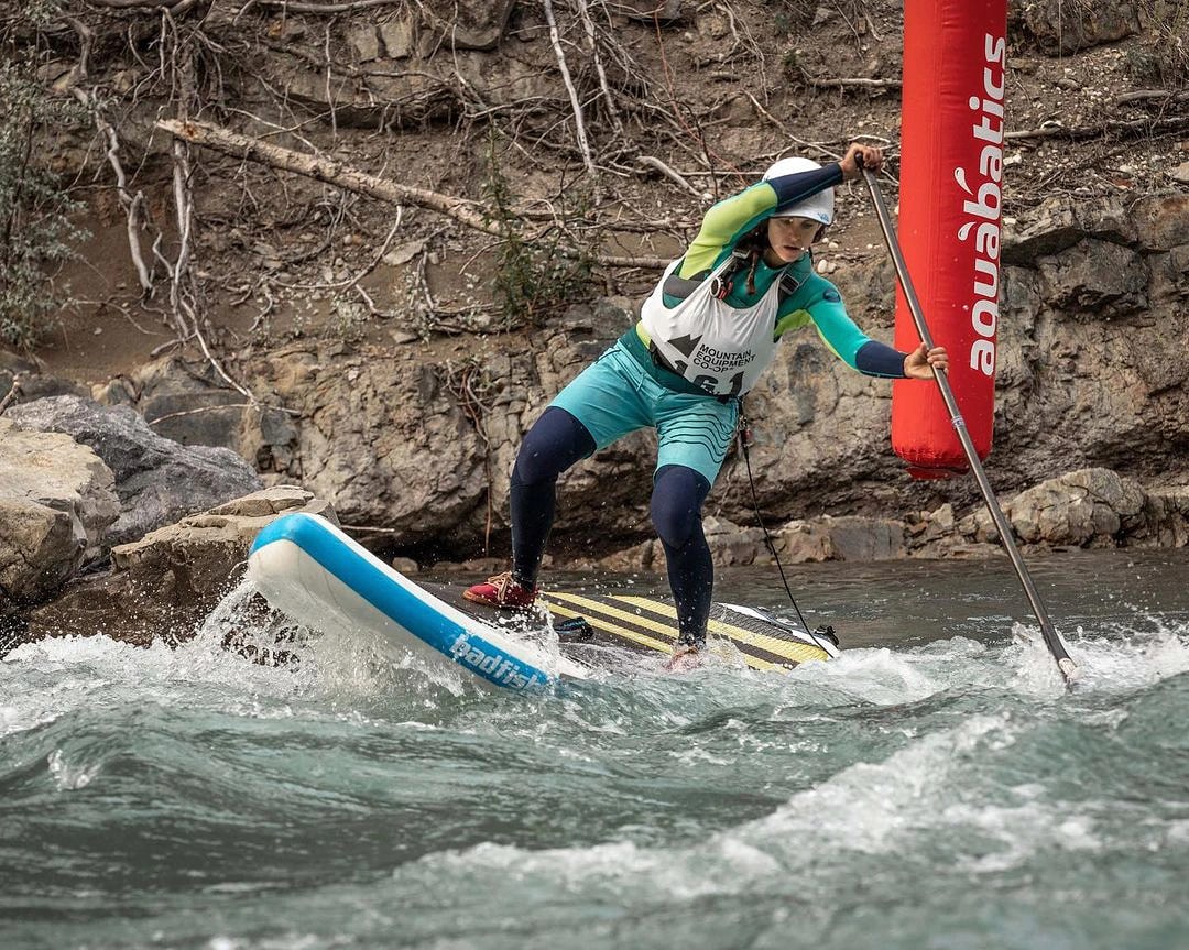 Paddleboarding white water rapids at the Kananaskis Whitewater Festival