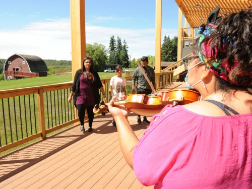 Metis Crossing Alberta Metis Fest jigging with fiddler
