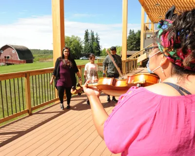 Metis Crossing Alberta Metis Fest jigging with fiddler