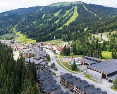 Sun Peaks Centre festival venue, seen from above, tying festivals into alpine beauty.