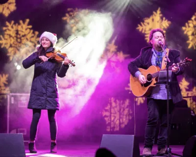 Musicians performing on mainstage at Surrey Tree Lighting Festival.